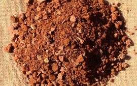 A small portion of bindoon red sand, there are small rock granules into the sand mixture