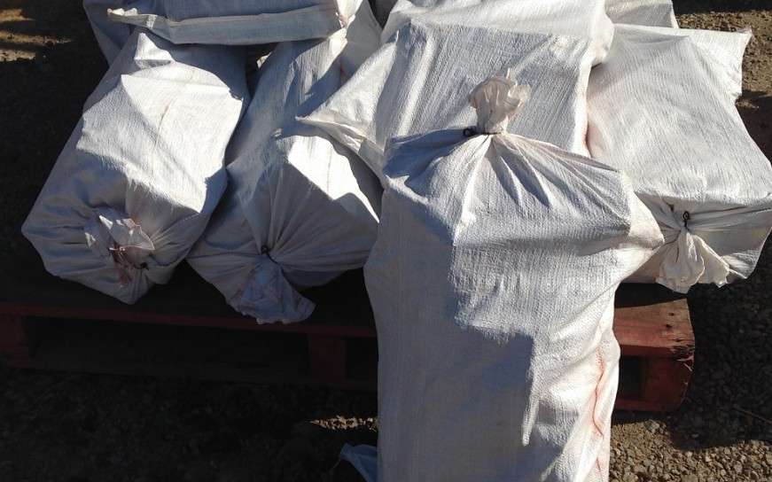 A couple of bags of split Jarrah firewood, great for keeping the home warm in winter